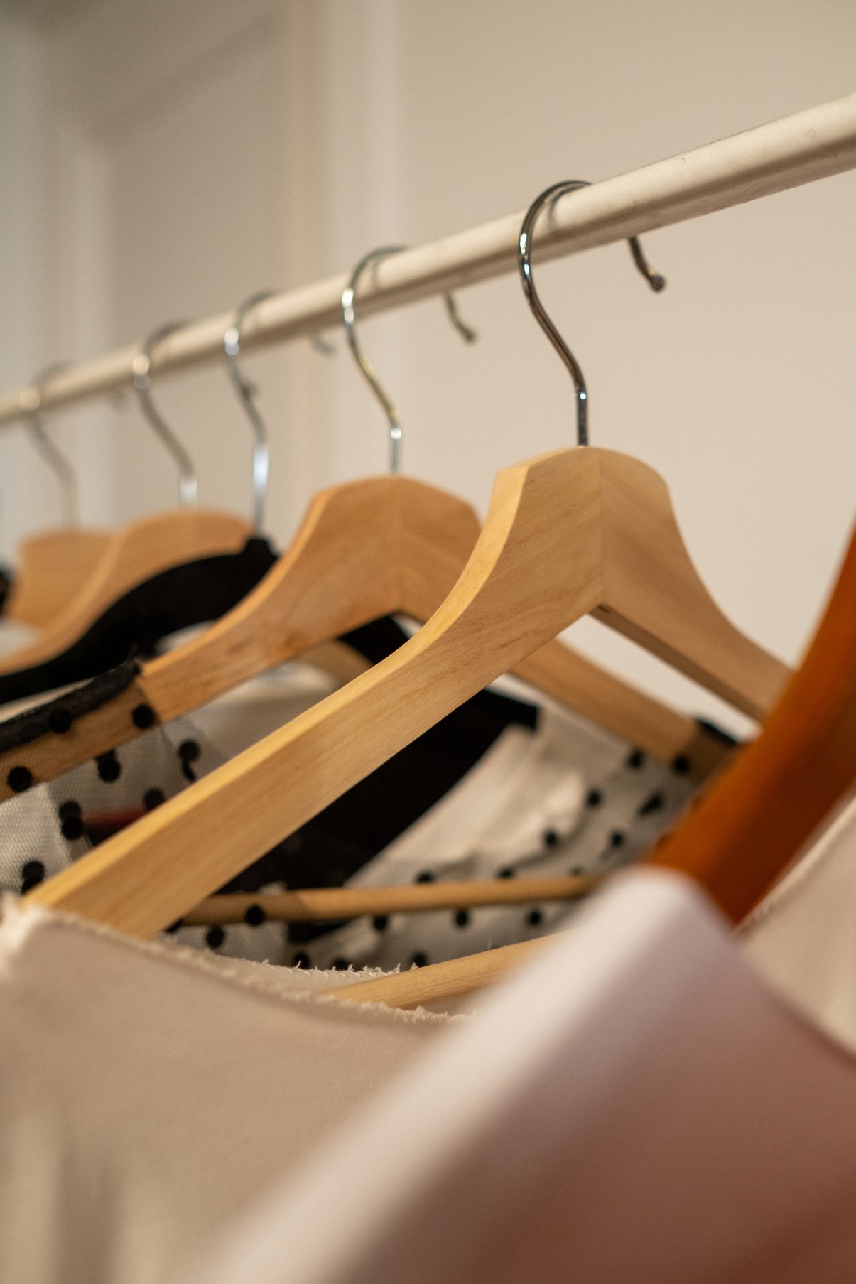 A Close up on Hangers with Clothes